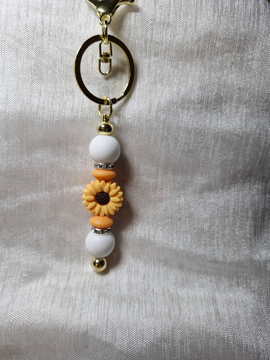 Porte clé pâquerette et feuilles