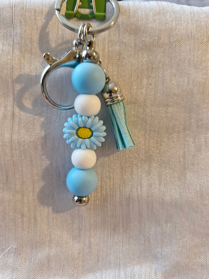 Porte clé pâquerette et feuilles