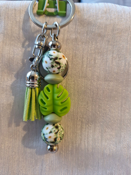 Porte clé pâquerette et feuilles