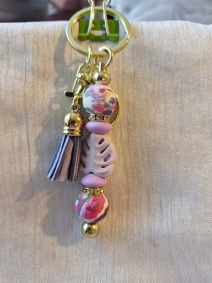 Porte clé pâquerette et feuilles