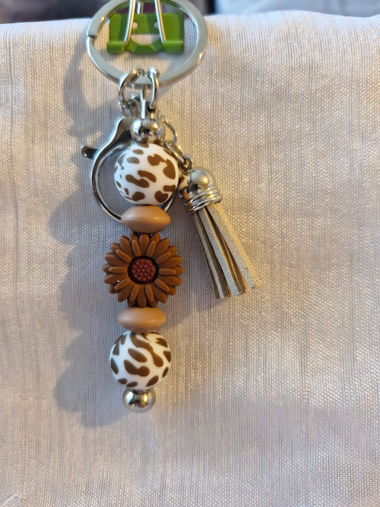 Porte clé pâquerette et feuilles