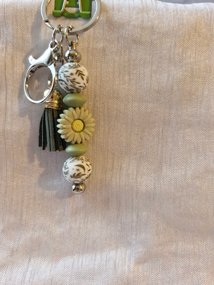 Porte clé pâquerette et feuilles