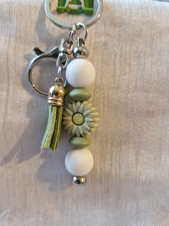 Porte clé pâquerette et feuilles