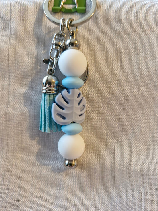 Porte clé pâquerette et feuilles