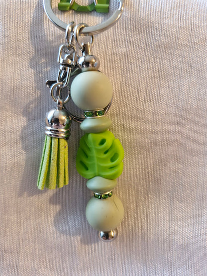 Porte clé pâquerette et feuilles