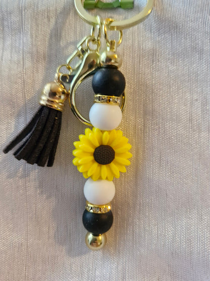 Porte clé pâquerette et feuilles